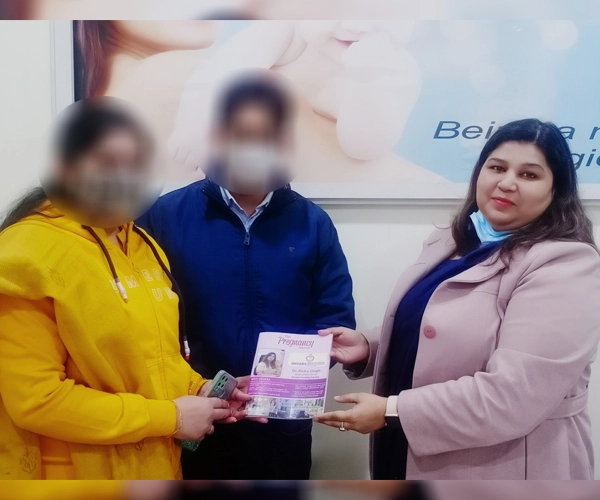 Husband and Wife after the IVF procedure (Left) With Dr. Richa Singh (Right) at Best Fertility Clinic in Lucknow